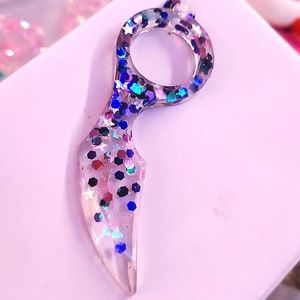 Sold Resin glitter claw daggers